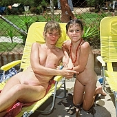 camp bed, naked, stripped, young naturists, necklace, collar, freik�rperkultur, nudism, naturist family, to sun oneself, to sun, to sunbathe, deckchair, yellow, naturism, naturist, nudist, in a state of nature, in the buff, in the nude, unclad, beach, naturist beach, nudist beach, woman, man, young nudist, Samagatuma, Laua, Hawaii, CD 0093