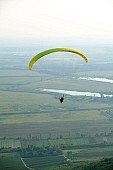 paragliding, paratrooper, jumping, parachute, parachutist, hill, hillside, countryside, nature, forest, grass, tree, green, river, curve, bend, water, arable, clod, earth, field, ploughland, tillage, meadow, range, pasture, grazer, parking, near, past, tower, television, bushes, trees, mountain, touch-down, to climb down, landing, to circle round, to lift off, to the left, thermic, yellow, to the right, down, up, Tokaj, clearing, glade, running leap, run up to, heater, headwind, wind, eye, front of, blow, lifting, brave, hardy, sport, evening, sunset, sky, lake, lakes, behind we legs, cut-off lands, tables, agriculture, agricultural land, road, car, house, shed, grapes, vineyards, vineyard, critter, haze, steam, vapor, fog, spare-time, leisure, time, Kiss L�szl�, L�szl� Kiss