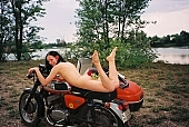 girl, young nudist, woman, motor, young girl, modell, lay, laid, blossom, bloom, flower, in a state of nature, in the buff, in the nude, naked body, nude body,  naked motorcyclist, nudism, naturism, young naturists, attitude, pose, posture, naked, stripped, unclad, photography, adjusment, red, sidecar, motor with a sidecar, holidays, Delegyhaza, CD 0094