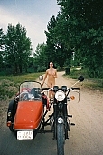 naked, stripped, naked body, nude body, naturism, girl, young nudist, woman, motor, young girl, modell, lay, laid, blossom, bloom, flower, rose, in a state of nature, in the buff, in the nude,  naked motorcyclist, nudism, young naturists, attitude, pose, posture, unclad, photography, adjusment, red, sidecar, motor with a sidecar, holidays, Delegyhaza, CD 0094, to run