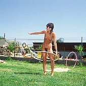 to sport, Hawaii, naked, stripped, young naturists, nudism, grass, hula hoop girls, hula hoop, to sun oneself, to sun, to sunbathe, naturism, naturist, family, naturist family, game, nudist, in a state of nature, in the buff, in the nude, chirpy, sunlight, summer, unclad, beach, naturist beach, nudist beach, woman, man, young nudist, Samagatuma, Laua, CD 0093