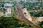 Szentes, Szentes city, Csongrad county, engine, engines, rail, tracks, station, railway station, Hungary, depot, train, trains, marshalling-yard, transfer station, shunting yard, switchyard, transportation, traveling, freight train, goods train, railway carriage, car, carriage, coach, vehicle of transport, platform, rails, track, offset, start, setout, arrival, waiting hall, waiting room, waiting, deck, outskirts, residential area, green, tree, trees, water tower, air photograph, air photo, air photos, aerials, aerial, birds eye view, tower blocks, block of flat, block of flats, tower block, high, concrete, town, city, building estate, faubourg, house, houses, line of houses, street, streets, building, buildings, park, garden, environment, ambience, neighbor, neighborhood, everyday life, at home, countryside, aldermanry, plan, air, square, plot, building operations, development, gardens, rooftop, beauty, beautiful, pretty, white, blue, brown, yellow, flat, gray, of birds eye view, regular, CD 0029, Kiss Lszl, Lszl Kiss