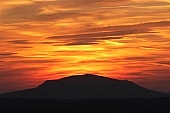 sunset, red, castle, castle of Somlo, wine-country, wine-district, sun, corona, crown, Somlo, fire, scenery, Hungary, sky, grapes, basalt, garpe-plantation, garpe-plantations, clouds, cloud, mountain, hill, cross, volcano, volcanic, God, religion, persuasion, silence, quiet, orange, color, colour, yellow, glowing, mysterious