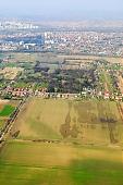 soil, ground, aerials, air photographs, airphotograph, critter, haze, steam, vapor, yellow, green, streets, building estate, town, city, roads, ways, parcel, plow, field, arable, clod, earth, ploughland, tillage, cultivation, grower, agriculture, agricultural land, air, aerial, of the air, plan, inland inundation, water, grass, nature, grain, cereals, cornfield, corn, brown, dirt road, homestead, farm, park, forest, Szeged, river, Tisza, outskirts, garden city, garden suburb, house, houses, line of houses, Kiss L�szl�, L�szl� Kiss