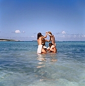 naturism, naturist, naturist man, naturist lady, nudist, nudist lady, naturist group, nudist band, confab, talking, naturist woman, naturist girl, St Martin, girl, woman, man, white, clouds, unclad, stripped, naked, sunbather, sky, wet, peace, affection, liking, love, unclothed, adult, nature, in the nature, blue, sand, with sand, island, coast, beach, sea, billows, deep, wind, swim, bathing, tobe under water, game, grouped game, straight header, dive, aqua balett, sport, to sport, hair, pie in the sky, naturist beach, laughing, laugh, smile, delight, zest for life, summer, recreation, relaxation, repose, rest, warm, water, salt, salt water, wave, short sea, gale, frothy, effervescent, 1988, CD 0034, interloking