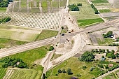 highway, road making, aerial, road, E5, E75, Szeged, Budapest, air photograph, air photo, Kecskemet, Kiskunfelegyhaza, Hungary, transportation, traffic, horticulture, barrier, bar, fence, birds eye view, banister, delimination, bridge, holiday home, holiday resort, holidaymakers, house, houses, overpass, perspective, nature, bridges, power-line, wire, fruit tree, plantation, electric line, car, cars, lane, lanes, painted lane, speed, range of speeds, fast, fast transportation, menacing, cloud, clouds, sky, cut, dike, ditch, pit, trench, water-jump, asphalt, bitumen, blacktop, concrete, standing, arc of a circle, arc, Kiss L�szl�, L�szl� Kiss