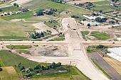 highway, road making, air photograph, road, M5, E5, E75, Szeged, Budapest, air photo, Kecskemet, Kiskunfelegyhaza, Hungary, transportation, traffic, horticulture, barrier, bar, fence, birds eye view, banister, delimination, bridge, holiday home, holiday resort, holidaymakers, house, houses, overpass, perspective, nature, bridges, power-line, wire, fruit tree, plantation, electric line, car, cars, lane, lanes, painted lane, speed, range of speeds, fast, fast transportation, menacing, cloud, clouds, sky, cut, dike, ditch, pit, trench, water-jump, asphalt, bitumen, blacktop, concrete, standing, arc of a circle, arc, Kiss L�szl�, L�szl� Kiss