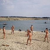 naturist, sunbathing, sand, sands, volleyball, nudist, naturist woman, naturist man, nudist women, nudist man, naturist girl, naturist family, naturist couple, sun, sunlight, recreation, relaxation, repose, rest, disengagement, distraction, resource, nature, summer, holidays, fry, swelter, health, saunter, bathe, bathing, as brown as a berry, near nature, beach, waterfront, lake, lake side, field naturist, game, sport, Polish, Poland, Kryspinow, 1989, CD 0059