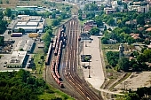 Szentes, Szentes city, Csongrad county, Hungary, railway station, depot, train, trains, engine, engines, rail, tracks, station, marshalling-yard, transfer station, shunting yard, switchyard, transportation, traveling, freight train, goods train, railway carriage, car, carriage, coach, vehicle of transport, platform, rails, track, offset, start, setout, arrival, waiting hall, waiting room, waiting, deck, outskirts, residential area, green, tree, trees, water tower, air photograph, air photo, air photos, aerials, aerial, birds eye view, tower blocks, block of flat, block of flats, tower block, high, concrete, town, city, building estate, faubourg, house, houses, line of houses, street, streets, building, buildings, park, garden, environment, ambience, neighbor, neighborhood, everyday life, at home, countryside, aldermanry, plan, air, square, plot, building operations, development, gardens, rooftop, beauty, beautiful, pretty, white, blue, brown, yellow, flat, gray, of birds eye view, regular, CD 0029, Kiss Lszl, Lszl Kiss