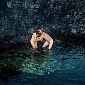 nudist couple, nudist pair, naked, stripped, nudism, naturist couple, game, reflection, naturism, nudist, naturist, nudist man, bathe, bathing, naturist man, nudist women, naked couple, naturist woman, rock coast, happiness, delight, laughing, laugh, lymph, cristal clean, holidays, on holiday, recreation, relaxation, repose, rest, attitude, pose, posture, stony, craggy, bay, gulf, clear, hygienic, pure, clean, Hawaii, Kona, Honokohau, Queen s bath, 1987, man, woman, bath, bath, water, stone, stones, rock, scrag, bush, CD 0090