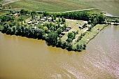 Hungary, birds eye view, sunbather, holiday house, camping, caravan, lakesystem, tent, Sziksosfurdo, recreation, peninsula, disengagement, distraction, resource, beach, Szeged, dirt road, road, roads, ways, house, houses, holiday houses, weekend house, week-end houses, lake, lakes, nature, rower lake, fishpond, surf lake, air photograph, homestead, farm, boondocks, boonies, periphery, arable, clod, earth, field, ploughland, tillage, recreation area, forest, water, tree, woody, grassy, soddy, green, CD 0055, Kiss Lszl, Lszl Kiss