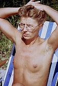 naturist, nudist, naturist woman, naturist man, nudist women, nudist man, naturist girl, girls, naturist family, naturist fellowship, friend, friends, girlfriend, naked, stripped, unclothed, be on the beach, sun, sunlight, sunbathing, deckchair, beach blanket, sunshine, hair, warm, recreation, relaxation, repose, rest, disengagement, distraction, resource, confab, talking, nature, summer, holidays, fry, swelter, health, as brown as a berry, near nature, beach, waterfront, lake, lake side, field naturist, Polish, Poland, Miedzeszyn, 1989, CD 0036, Kiss L�szl�, L�szl� Kiss