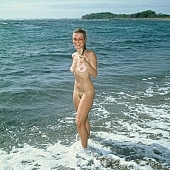 to sun oneself, to sun, to sunbathe, waterfront, woman, unclad, stripped, nudist, naturist, bay, gulf, waves, billows, naked, island, nudism, to froth, peninsula, water-front, sea, deep, naturism, beach, dame, lady, girl, young, coast, bathe, bathing, pretty, beauty, beautiful, attitude, pose, nude, nudity, Honokohau, Kona, Hawaii, CD 0087