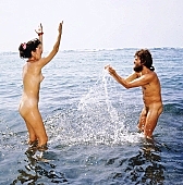 70, Hawaii, nudist couple, nudist pair, Honokohau, Kona, fkk, naked, stripped, naturist couple, naturist, holidays, nudist, love, freik�rperkultur, on holiday, recreation, relaxation, repose, rest, game, beach, coast, nudism, naturism, attitude, pose, posture, heat-wave, they are walking, bay, gulf, summer, man, woman, bath, bathe, bathing, water, CD 0106