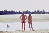 naturist, nudist, naturist woman, naturist man, nudist women, nudist man, naturist girl, girls, child, naturist family, naturist fellowship, friend, friends, girlfriend, naked, stripped, unclothed, be on the beach, sun, sunlight, sun-bathing, sunbathing, recreation, relaxation, repose, rest, disengagement, distraction, resource, confab, talking, nature, summer, holidays, fry, swelter, health, as brown as a berry, near nature, beach, bathe, bathing, splash, paddle, waterfront, lake, lake side, field naturist, Polish, Poland, Miedzeszyn, 1989, CD 0036, Kiss L�szl�, L�szl� Kiss