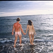 nudist man, nudist couple, nudist pair, beach, coast, horizon, bathe, bathing, naturist man, nudist women, naked couple, naturist woman, naked, stripped, rock coast, happiness, delight, laughing, laugh, hand in hand, nudist, naturist, lymph, cristal clean, nudism, naturism, naturist couple, holidays, on holiday, recreation, relaxation, repose, rest, game, attitude, pose, posture, stony, craggy, bay, gulf, clear, hygienic, pure, clean, Hawaii, Kona, Honokohau, Queen s bath, 1987, man, woman, bath, bath, water, stone, stones, rock, scrag, bush, CD 0091