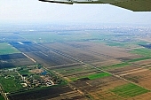 aerial, Szeged, birds eye view, of birds eye view, soil, ground, parcel, plow, field, arable, clod, earth, ploughland, tillage, cultivation, grower, agriculture, agricultural land, air, air photograph, air photo, of the air, plan, inland inundation, water, green, grass, nature, grain, cereals, cornfield, corn, black, brown, dirt road, homestead, farm, farms, park, sheds, forest, Kiss Lszl, Lszl Kiss