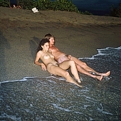 fkk, naked, stripped, naturist, INF, Queen s bath, Honokohau, naturist pair, family, summer, recreation, relaxation, repose, rest, unclad, sea, billows, deep, cloud, clouds, sand, evening, wave, sunset, nightfall, plant, bath, bath, woman, pair, man, friend, people, CD 0070