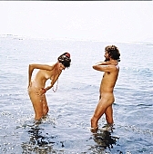 71, Hawaii, freik�rperkultur, nudist couple, nudist pair, Honokohau, Kona, fkk, naked, stripped, naturist couple, naturist, holidays, nudist, love, on holiday, recreation, relaxation, repose, rest, game, beach, coast, nudism, naturism, attitude, pose, posture, heat-wave, they are walking, bay, gulf, summer, man, woman, bath, bathe, bathing, water, CD 0106