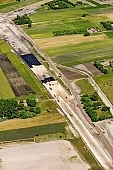 highway, road making, air photograph, road, M5, E5, E75, Szeged, Budapest, air photo, Kecskemet, Kiskunfelegyhaza, Hungary, transportation, traffic, horticulture, barrier, bar, fence, birds eye view, banister, delimination, bridge, holiday home, holiday resort, holidaymakers, house, houses, overpass, perspective, nature, bridges, power-line, wire, fruit tree, plantation, electric line, car, cars, lane, lanes, painted lane, speed, range of speeds, fast, fast transportation, menacing, cloud, clouds, sky, cut, dike, ditch, pit, trench, water-jump, asphalt, bitumen, blacktop, concrete, standing, arc of a circle, arc, Kiss L�szl�, L�szl� Kiss