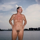 naturist, smile, delight, happiness, sunbathing, sand, naturist fellowship, nudist band, nudist, naturist man, nudist man, sun, sunlight, recreation, relaxation, repose, rest, disengagement, distraction, resource, nature, summer, holidays, fry, swelter, health, bathe, bathing, as brown as a berry, happy, joyful, joyfully, glad, laughing, laugh, entertainment, getting acquainted, near nature, beach, waterfront, lake, lake side, field naturist, Polish, Poland, Kryspinow, 1989, CD 0060