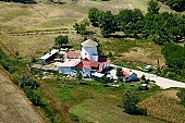 Felgy�, windmill of Felso major, grind, milling, monument, cross, crossroad, art relic, national monument, mill, homestead, farm, revolving energy, sleet, windmill, shingle, farmhouse, rye, flour, Csongrad county, millstone, grindstone, barley, core, millet, pound, hutch, abattoir, miller, chaff, wheat, gearing, shoot, grain, house, wind, green, garden, recreation, relaxation, repose, rest, silence, quiet, orchard, houses, road, carriageway, bread, fence, tree, trees, air photograph, air photo, air photos, aerials, birds eye view, of birds eye view, building, buildings, everyday life, at home, countryside, plan, air, aerial, square, plot, development, beauty, beautiful, pretty, white, blue, brown, yellow, flat, gray, dirt road, sand, lowland, regular, CD 0029, Kiss L�szl�, L�szl� Kiss