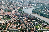 Hungary, Szeged, air photograph, air photo, air photos, aerial, aerials, birds eye view, tower blocks, block of flat, block of flats, tower block, high, concrete, Radio 88, town, city, outskirts, city center, building estate, garden city, garden suburb, faubourg, house, houses, line of houses, crossroads, crossing, street, streets, circuit, boulevard, circuits, car, road, cars, waterworks, art museum, building, buildings, park, green, garden, environment, ambience, neighbor, neighborhood, everyday life, at home, countryside, aldermanry, plan, air, promenad, square, classical, recent, trendy, of value, of high value, expensive, plot, building operations, development, gardens, rooftop, beauty, beautiful, pretty, bridge, bridge of downtown, river, Tisza, garden pool, pool, vat, bogie, luxory places, luxory housing, white, blue, brown, yellow, flat, gray, of birds eye view, regular, Tarjn, Bertalan, CD 0029, Kiss Lszl, Lszl Kiss