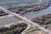 62, bridge, Szeged, Mak, Mora Ferenc, highway, M43, Mako and Szeged between, air photograph, air photo, hanging bridge, truss bridge, 660 meter, 31.6 km, Tisza, building, camion, car, transit traffic, 2011th April 20, singular, lonesome, unique, rarity, Hungary, Csongrad, county, Europe, Kiss Lszl, Lszl Kiss