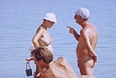 naturism, naturist, nudist, naturist woman, naturist man, nudist women, nudist man, naturist girl, naturist family, together, confab, talking, joyful, joyfully, glad, family picnic, sun, sunlight, sun-bathing, sunbathing, recreation, relaxation, repose, rest, disengagement, distraction, resource, nature, summer, holidays, fry, swelter, health, saunter, bathe, bathing, as brown as a berry, near nature, beach, waterfront, lake, lake side, field naturist, Polish, Poland, Kryspinow, 1989, CD 0036, Kiss L�szl�, L�szl� Kiss