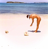 naturism, naturist, saunter, togo walking on the beach, seashell, seashell-collecting, naturist lady, nudist, nudist lady, naturist woman, sail, boat, naturist girl, St Martin, Club Orient, Orient, girl, woman, club, white, clouds, unclad, stripped, naked, sky, wet, peace, affection, liking, love, unclothed, adult, nature, in the nature, blue, sand, island, beach, coast, sea, billows, deep, wind, hair, pie in the sky, delight, zest for life, summer, recreation, relaxation, repose, rest, warm, water, gale, 1988, CD 0034