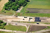 highway, road making, air photograph, road, M5, E5, E75, Szeged, Budapest, air photo, Kecskemet, Kiskunfelegyhaza, Hungary, transportation, traffic, horticulture, barrier, bar, fence, birds eye view, banister, delimination, bridge, holiday home, holiday resort, holidaymakers, house, houses, overpass, perspective, nature, bridges, power-line, wire, fruit tree, plantation, electric line, car, cars, lane, lanes, painted lane, speed, range of speeds, fast, fast transportation, menacing, cloud, clouds, sky, cut, dike, ditch, pit, trench, water-jump, asphalt, bitumen, blacktop, concrete, standing, arc of a circle, arc, Kiss L�szl�, L�szl� Kiss