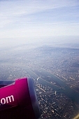 air, aerial, air photograph, white, blue, pink, Budapest, ray, beam, aerials, Margit-sziget, Margit sziget, Duna, capital, capital city, capital town, Wizz Air, turbine, air photo, cloud, light, sky, birds eye view, high, airplane, plane, air photos, environment, ambience, plan, purple, magenta, traveling, sun-ray, island, of birds eye view, above, up, CD 0029, Kiss L�szl�, L�szl� Kiss