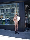 naturism, nudism, naturist man, nudist man, street, streets, street-door, naked, stripped, unclothed, in a state of nature, in the buff, in the nude, hat, in a hat, respect, notable, remarkable, shtick, San Francisco, table, notice board, billboard, to promot, fkk, free, body, crop, free body culture, advertisement, Golden Gate bridge, bridge, mayor, George Davis, CD 0074