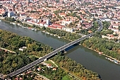 aerial, Szeged, Pick salami factory, meat-packing, Novotel Hotel, wharf, air photograph, air photo, town, city, upwards, of birds eye view, road, roads, ways, building estate, housing estate, Felsovaros, Tisza, river, riverside, crossroad, Felso Tisza bank, house, houses, panel concrete house, tree, trees, green belt, forest, square, playground, mansions, multy-storey house, apartment house, block of flats, owner-occupied block, bridge, new bridge, Bertalan, Ujszeged, garden city, garden suburb, free beach, ship, water house, floating house, inner port, boat, floodplain, flood-basin, bank, bund, embankment, 2007, CD 0042, air, of szeged, Kiss Lszl, Lszl Kiss