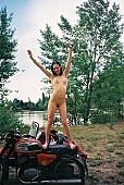 young girl, modell, motor, naked body, nude body, naked motorcyclist, nudism, naturism, girl, young naturists, young nudist, attitude, pose, posture, naked, stripped, unclad, photography, adjusment, red, sidecar, motor with a sidecar, holidays, Delegyhaza, CD 0094,  naked motorcyclist