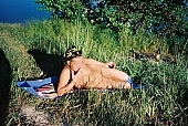 nudism, nude woman, sun, sunshine, naturism, russian, russian naturist, nudist, waterfront, naturist, woman, naked, stripped, in a state of nature, in the buff, in the nude, nudity, nude, nakedness, body, nature, outdoors, without doors, recreation, relaxation, repose, rest, entertainment, grass, in the grass, Moscow, Russia, CD 0097