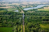 Szentes, Szentes city, Csongrad county, railway, concrete, iron, rail, tracks, train, cranky, crooked, devious, sinuous, winding, agitated, troubled, obscure, roily, , duckweed, vehicular, road bridge, railway bridge, bridge, bridges, forest, tree, trees, Tisza, fair Tisza, green, slob, coast, inundation, flood, high tide, high water, low tide, low water, agriculture, farmlands, farmland, field, sunshine, sunlight, summer, spring, aerials, aerial, birds eye view, garden, environment, ambience, plan, air, air photograph, of birds eye view, CD 0029, Kurca, Kiss L�szl�, L�szl� Kiss