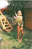 naturist, congratulation, girl, bouquet, blossom, bloom, flower, award, sun, sunshine, friend, scale, stairway, girlfriend, brown, skin, sunlit, delight, smile, unclad woman, woman, INF, naturist beach, taking photographs, attitude, pose, nude, nudity, naked girl, unclad body, young naturists, naked body, nude body, nudist place, fkk, posture, naturist girl, in a state of nature, in the buff, in the nude, naturism, unclad, stripped, nudist, nudism, young, naked, recreation, relaxation, repose, rest, camping, beach, Delegyhaza, CD 0095