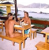 nudist lady, naturist woman, naturist man, naturist parents, naturist family, nudist, St Martin, Club Orient, Orient, naturism, naturist, naturist group, restaurant, meal, food, drink, lunch, dinner, to clink glasses, health, to look towards, cheerio, siesta, short nap, entertainment, terrace, wood furniture, chalet, nordic, soaking, tanning, island, sailing, boat, summer, naturist girl, club, girl, woman, man, sailing boat, unclad, stripped, naked, wet, peace, silence, quiet, affection, liking, love, unclothed, adult, nature, in the nature, blue, sand, grass, sunlight, sunshine, coast, beach, pie in the sky, laughing, laugh, smile, together, coexistence, holidays, delight, zest for life, warm, water, ship, recreation, relaxation, repose, rest, confab, talking, on holiday, refection, 1988, CD 0034