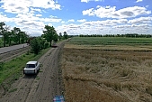 harvest, wheat, grain, Trabant, automobile, German Demokratic Republic automobile, two stroke engine, birds eye view, corn, rye, oats, barley, agricultural  plantland, agricultural cultivation of plants, wheat flour, farmland, wheat-crop, cornfield, wheat-sheaf, food product, groceries, ripe, wheat grain, farm product, wheat-field, field of wheat, agriculture, cereals, wheat-growing, ear, wheat-stalk, young wheat-crop, boundary, core, gold, wheatgerm, CD 0052, Kiss L�szl�, L�szl� Kiss