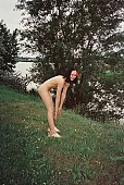 naked girl, attitude, pose, posture, unclad, stripped, tattooed, girl with a flower, poppy, nude, nudity, taking photographs, young naturists, nudist girl, naked, unclothed, pretty, nudist, fkk, INF, naturism, nudism, naturist, woman, young, in a state of nature, in the buff, in the nude, field, plant, field flower, wild flower, Delegyhaza, CD 0094, waterfront, water-front
