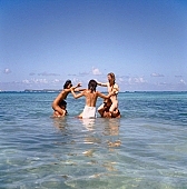 naturism, naturist, naturist man, naturist lady, nudist, nudist lady, naturist group, nudist band, confab, talking, naturist woman, naturist girl, St Martin, girl, woman, man, white, clouds, unclad, stripped, naked, sunbather, sky, wet, peace, affection, liking, love, unclothed, adult, nature, in the nature, blue, sand, with sand, island, coast, beach, sea, billows, deep, wind, swim, bathing, tobe under water, game, grouped game, straight header, dive, aqua balett, sport, to sport, hair, pie in the sky, naturist beach, laughing, laugh, smile, delight, zest for life, summer, recreation, relaxation, repose, rest, warm, water, salt, salt water, wave, gale, frothy, effervescent, 1988, CD 0034, short sea