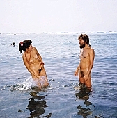 68, Hawaii, freik�rperkultur, nudist couple, nudist pair, Honokohau, Kona, fkk, naked, stripped, naturist couple, naturist, holidays, nudist, love, on holiday, recreation, relaxation, repose, rest, game, beach, coast, nudism, naturism, attitude, pose, posture, heat-wave, they are walking, bay, gulf, summer, man, woman, bath, bathe, bathing, water, CD 0106