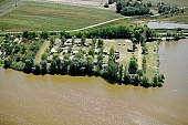 Sziksosfurdo, camping, Hungary, fishpond, birds eye view, sunbather, holiday house, caravan, lakesystem, tent, recreation, peninsula, disengagement, distraction, resource, beach, Szeged, dirt road, road, roads, ways, house, houses, holiday houses, weekend house, week-end houses, lake, lakes, nature, rower lake, surf lake, air photograph, homestead, farm, boondocks, boonies, periphery, arable, clod, earth, field, ploughland, tillage, recreation area, forest, water, tree, woody, grassy, soddy, green, CD 0055, Kiss Lszl, Lszl Kiss
