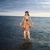 nudism, naturism, nudist, naturist, nudist man, nudist couple, nudist pair, beach, coast, horizon, bathe, bathing, naturist man, nudist women, naked couple, naturist woman, naked, stripped, rock coast, happiness, delight, laughing, laugh, lymph, cristal clean, naturist couple, holidays, on holiday, recreation, relaxation, repose, rest, game, attitude, pose, posture, stony, craggy, bay, gulf, clear, hygienic, pure, clean, Hawaii, Kona, Honokohau, Queen s bath, 1987, man, woman, bath, bath, water, stone, stones, rock, scrag, bush, CD 0091
