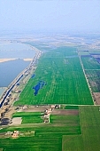 lake, fishpond, water, inland inundation, plow, field, parcel, soil, arable, clod, earth, ploughland, tillage, ground, airphotograph, air photos, aerials, aerial, Hungary, Szeged, white, blue, island, farms, homestead, agriculture, cultivation, grower, grass, green, nature, natural, air, of the air, plan, map, fishery, fishing, farm, sheds, house, houses, road, dirt road, table, wheatfield, Kiss Lszl, Lszl Kiss