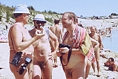 naturism, naturist, nudist, naturist woman, naturist man, nudist women, nudist man, naturist girl, naturist family, together, confab, talking, joyful, joyfully, glad, family picnic, sun, sunlight, sun-bathing, sunbathing, recreation, relaxation, repose, rest, disengagement, distraction, resource, nature, summer, holidays, fry, swelter, health, saunter, bathe, bathing, as brown as a berry, near nature, beach, waterfront, lake, lake side, field naturist, photographers, to pow-wow, discussion, fraternization, getting acquainted, exchange of experience, naturist photographer, photograph, picture, image, scenery, memory, afterimage, Polish, Poland, Kryspinow, 1989, CD 0036, Kiss L�szl�, L�szl� Kiss