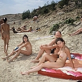 naturist family, naturist, dame, lady, naturist woman, sand, naturist fellowship, nudist band, nudist, naturist man, nudist women, nudist man, naturist girl, naturist couple, sun, sunlight, sunbathing, recreation, relaxation, repose, rest, disengagement, distraction, resource, nature, summer, holidays, fry, swelter, health, saunter, bathe, bathing, as brown as a berry, happy, joyful, joyfully, glad, laughing, laugh, entertainment, getting acquainted, familiar, domesticity, near nature, beach, waterfront, lake, lake side, field naturist, game, Polish, Poland, Kryspinow, 1989, CD 0060