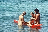 relaxation, siesta, short nap, in the nature, recreation, refection, mattress, young naturist, joung nudists, naked, unclothed, smile, family, nature, naturist family, air, sea, billows, deep, Honokohau, sand, regeneration, game, reformation, reform, rejuvenation, parent, fkk, mother, wind, joung fkk, hair, man, Hawaii, repose, rest, beauty, bloom, reviving, tonic, on holiday, summer, co-operation, collaboration, naturism, naturist, naturist lady, nudist, nudist lady, naturist woman, naturist girl, girl, nudist girl, woman, unclad, stripped, peace, affection, liking, love, adult, blue, red, beach, laughing, laugh, together, delight, zest for life, warm, 1986, CD 0035