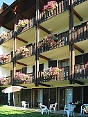 house, balcony, chair, morning, shadow, grass, flower, tree, sunlight, warm, sunshine, day, yellow, wall, glass, door, hotel, holiday home, holiday resort, chairs, courtyard, run, sunshade, window-box, panelling, Ossiacher, See, laker